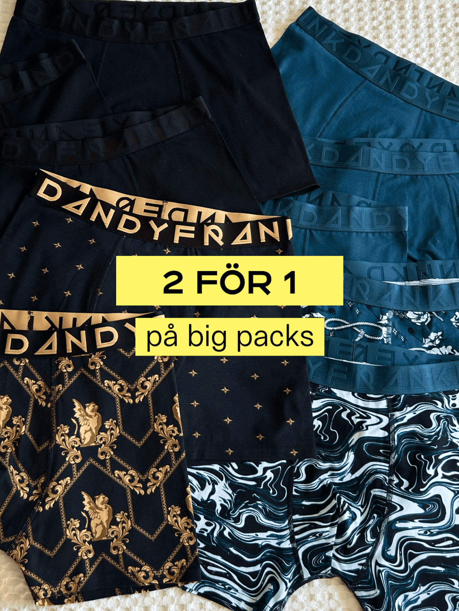 Assorted men's boxer briefs with various patterns are displayed. A yellow sign advertises "2 FÖR 1 på big packs."