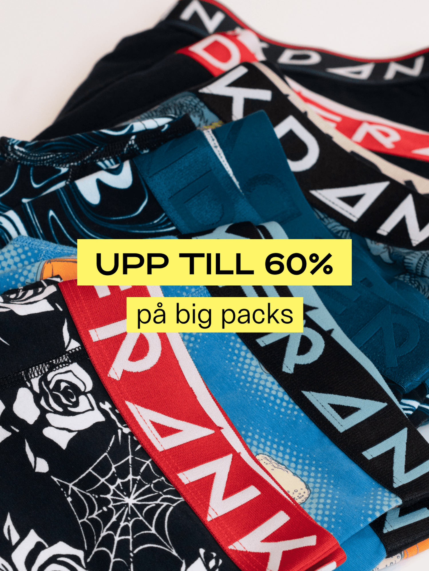 Colorful men's underwear with various patterns, labeled with a 60% discount offer on big packs in Swedish.